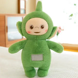 Peluche doudou teletubbies verte avec fourrure douce, visage rond, joues roses et patch rectangulaire argenté sur le ventre