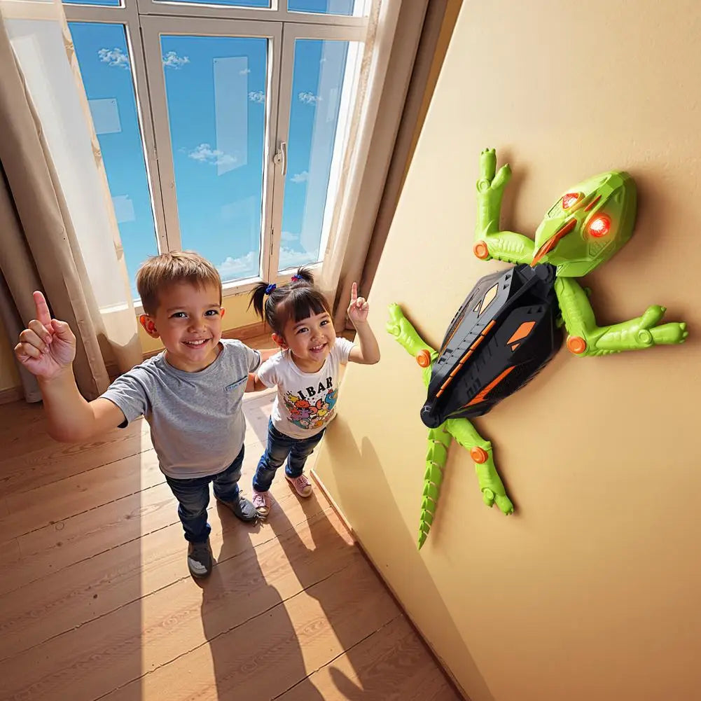 Jouet lézard qui monte au mur robot vert et noir lumineux avec yeux rouges télécommandé pour escalade murale