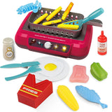 Jouet de cuisine couleur changeante avec grill en plastique rose, surface grise, ustensiles colorés et faux aliments