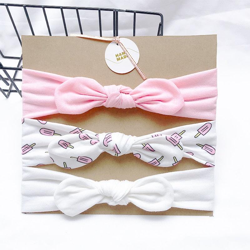 Fascia per bambina rosa e bianca con motivi (set da 3)