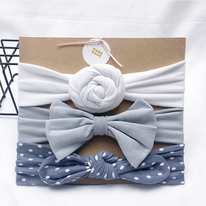 Bandeau fille couleur bleu et motif à pois blanc (lot de 3)