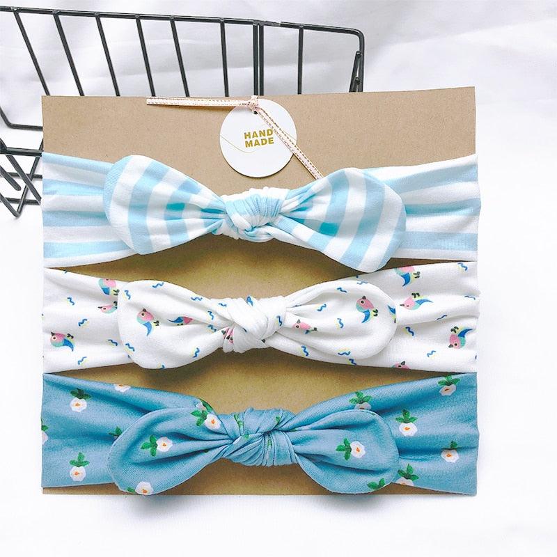 Fascia per capelli da bambina color blu e con piccoli motivi (confezione da 3)