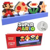 Lampe led décorative super mario pixelisée avec capteur rythme en rouge, beige, vert et noir sur base bleue