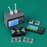 Lego moc accessoire lego adulte tv grise avec antennes blanches et écran pixelisé ciel bleu paysage vert