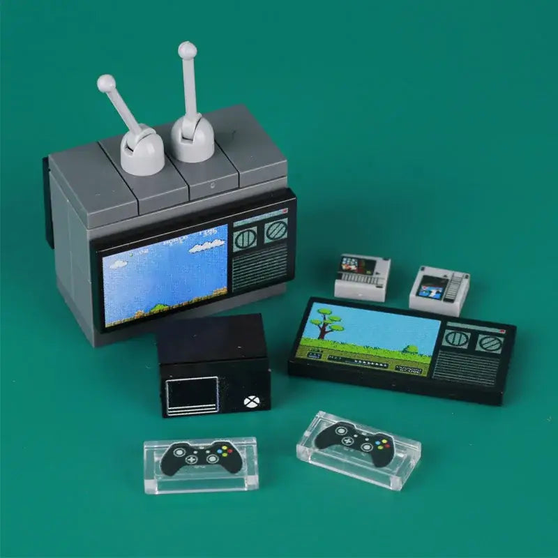 Gray lego moc télévision avec antennes blanches et écran jeu rétro accessoire lego adulte salle de jeux casino