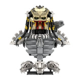 Lego moc alien predator beige et noir avec accents jaunes sur dreadlocks et détails rouges sur la bouche