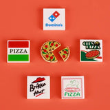 Miniature pizza slice lego moc alimentaire with red tomato and green olive toppings in detailed lego nourriture design