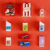 Lego moc alimentaire lego nourriture boîte de popcorn rayée rouge et blanc avec bulle jaune pop