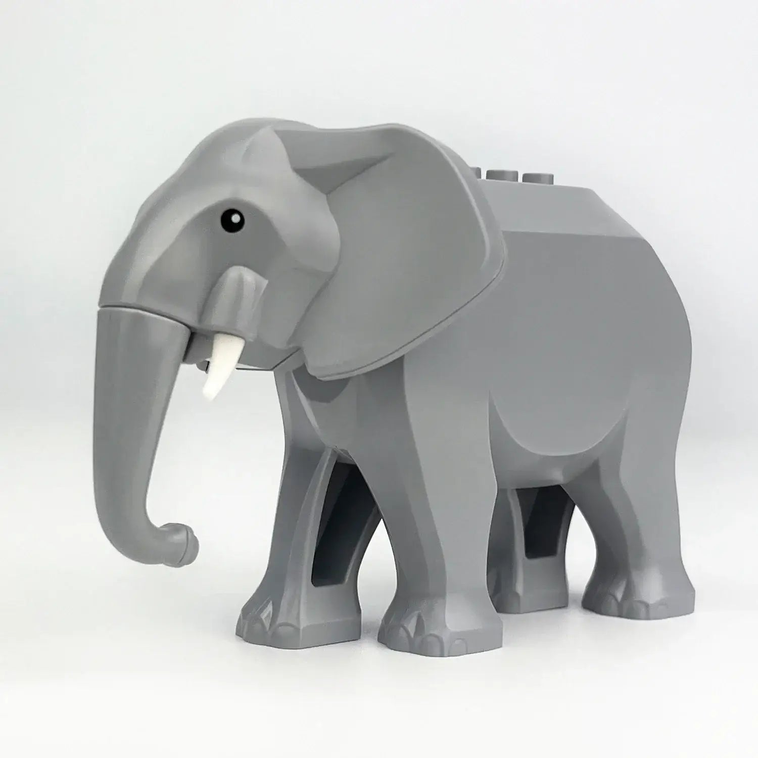 Lego moc éléphant gris avec défenses blanches et œil noir modèle lego animal détaillé
