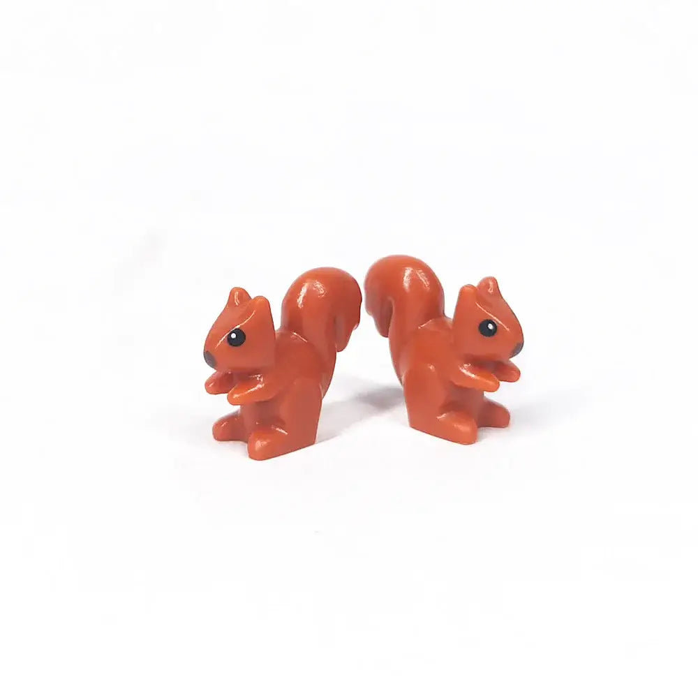Deux minifigures lego moc écureuil orange en plastique avec yeux noirs et nez marron pour lego animaux de ferme