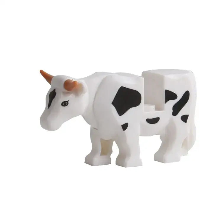 Figurine lego moc vache en plastique blanc avec taches noires et cornes orange pour lego ferme animaux