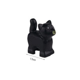 Minifigure lego moc chat en plastique noir avec nez vert et yeux blancs pour lego animaux de ferme