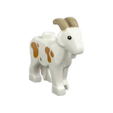Lego moc animaux de ferme figurine de chèvre blanche en plastique avec cornes beige et taches marron style lego classique
