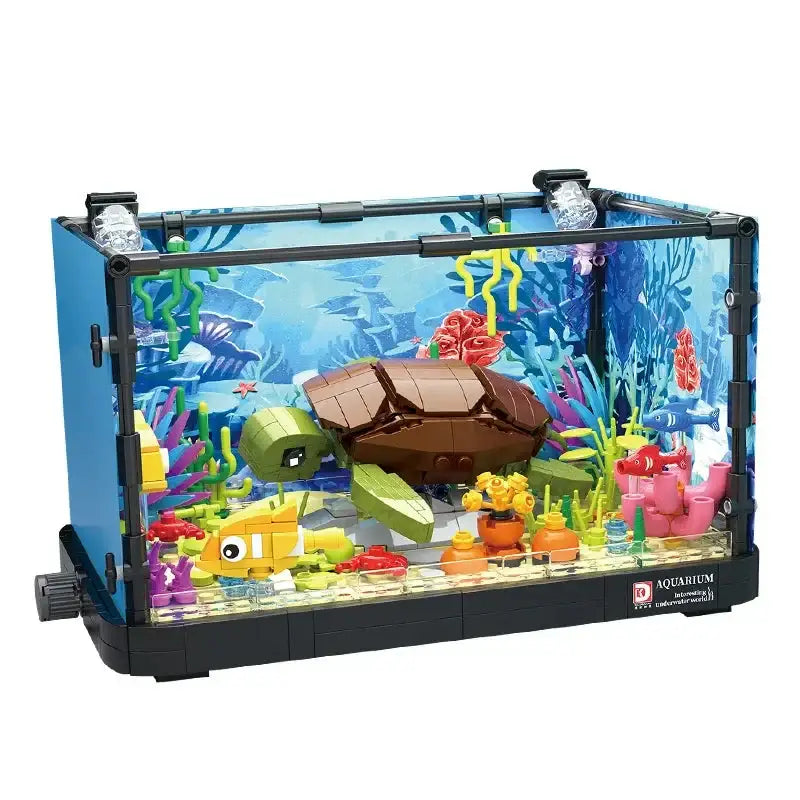 Ensemble lego aquarium tropical coloré avec tortue marron et verte, poisson jaune et corail vibrant en lego