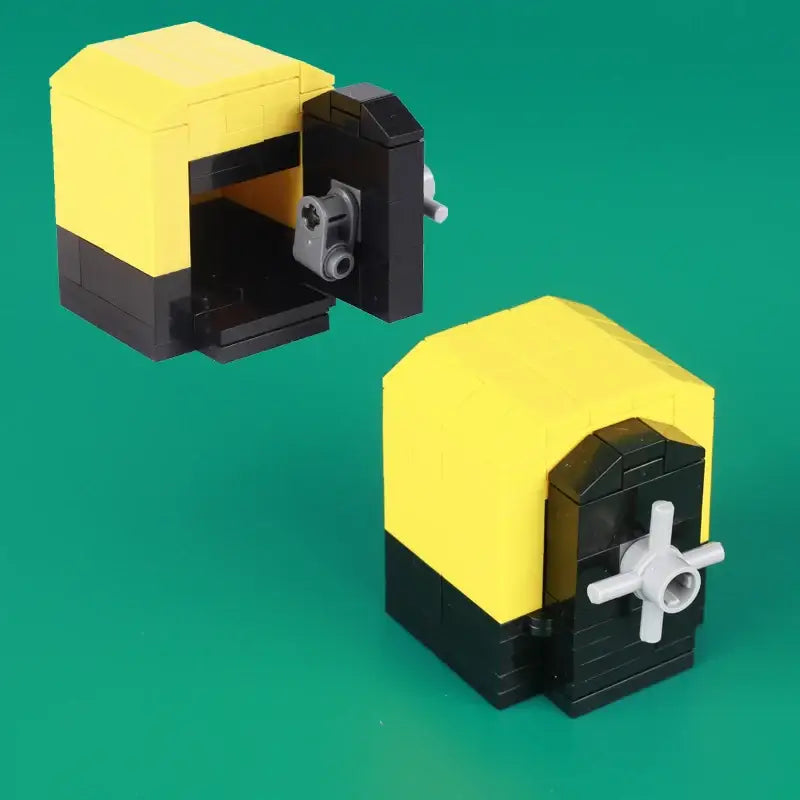 Lego moc banque coffre-fort en briques jaune et noir avec un cadran à combinaison gris pour sécuriser vos objets
