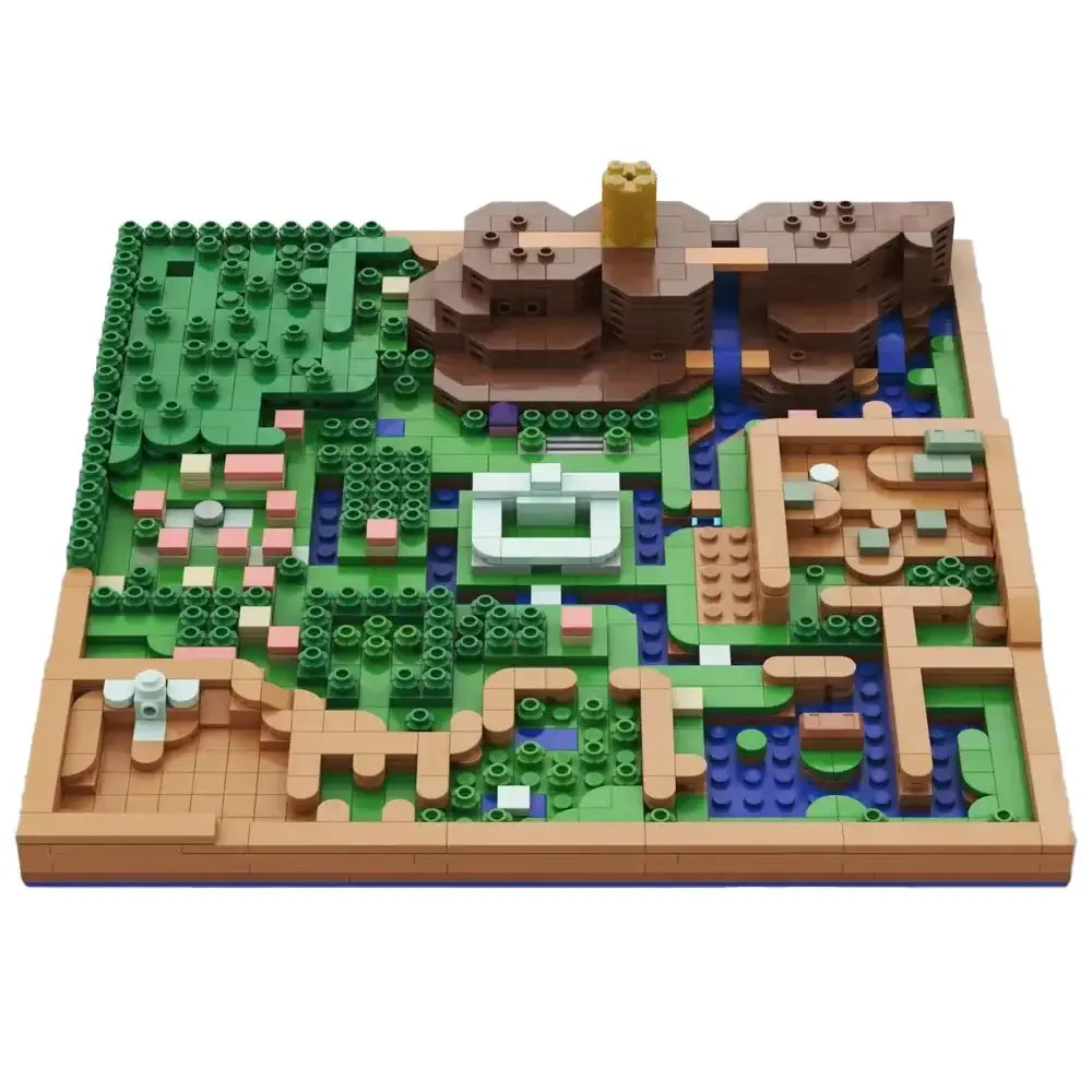 Lego moc carte a link to the past représentant une carte d’hyrule avec herbe verte, terre brune, voies d’eau bleues et chemins sable