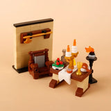Table lego moc medieval en bois marron avec nappe blanche miniature nourriture bougies et torche pour déguisement carnaval