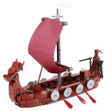 Lego moc medieval longship en lego rouge avec tête de dragon, voile rouge et rames pour déguisement carnaval
