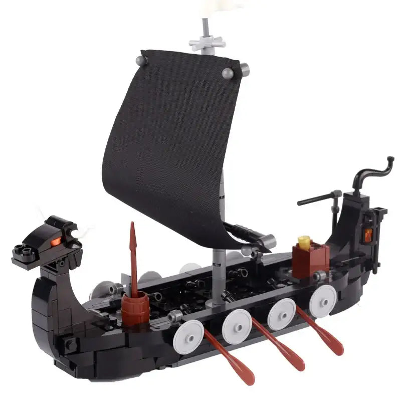 Lego moc medieval viking longship noir avec voile noire, rames rouges et détails blancs pour déguisement carnaval