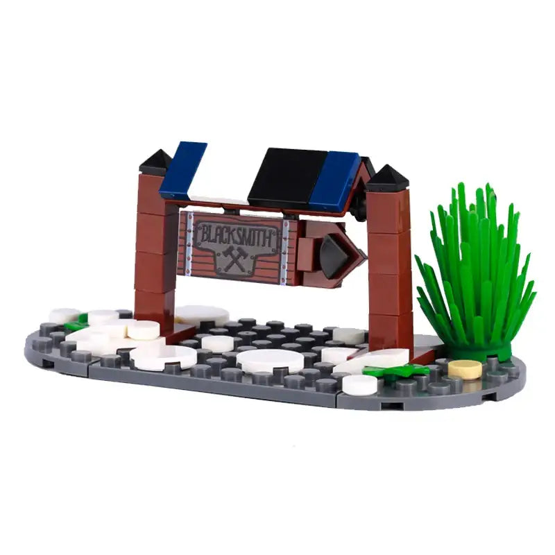 Lego moc medieval boutique de forgeron en briques marron et bleu avec enseigne marteaux croisés pour déguisement carnaval