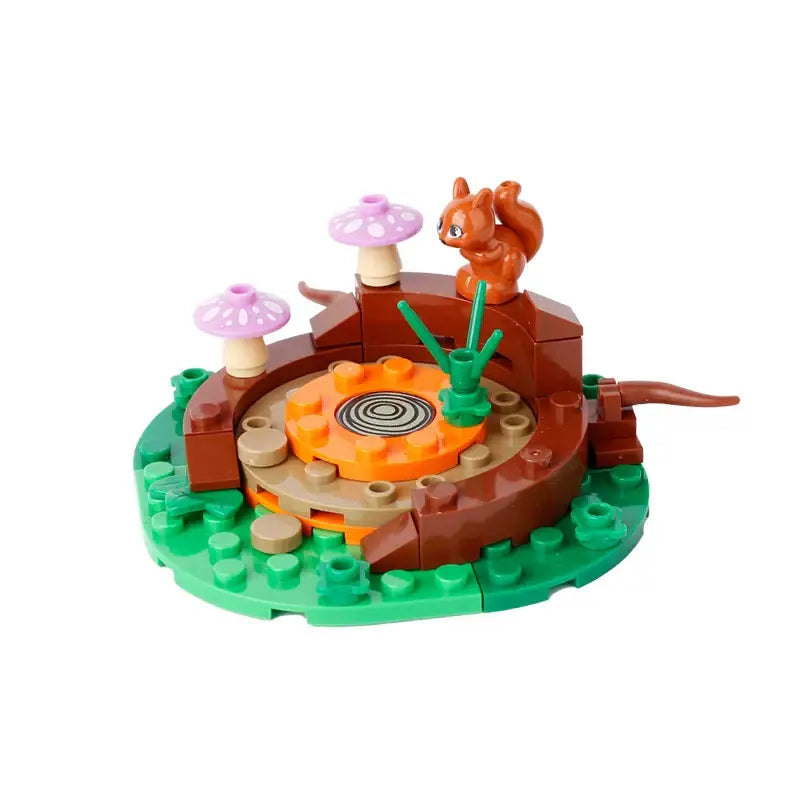 Un lego moc médiéval avec un écureuil marron sur une souche entourée de champignons roses et dherbe verte