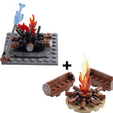 Lego moc medieval campfire en lego avec flammes translucides rouge et orange et accessoire lance poisson bleu