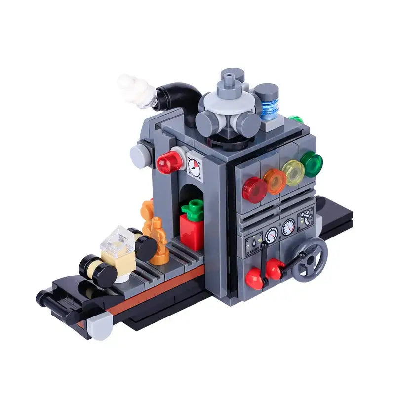 Lego moc décor de noël avec machine industrielle grise lego noël 2025 équipée de lumières translucides rouges vertes et orange