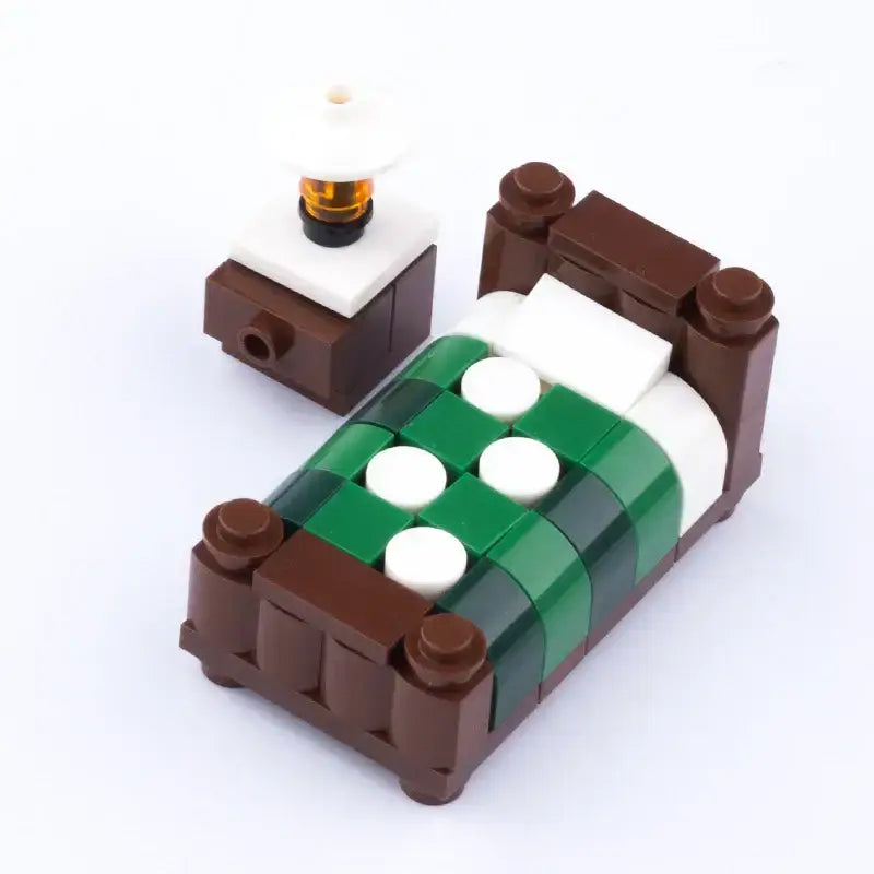 Lit lego moc marron avec literie à carreaux verts et blancs accessoire lego pour décoration intérieure maison moderne