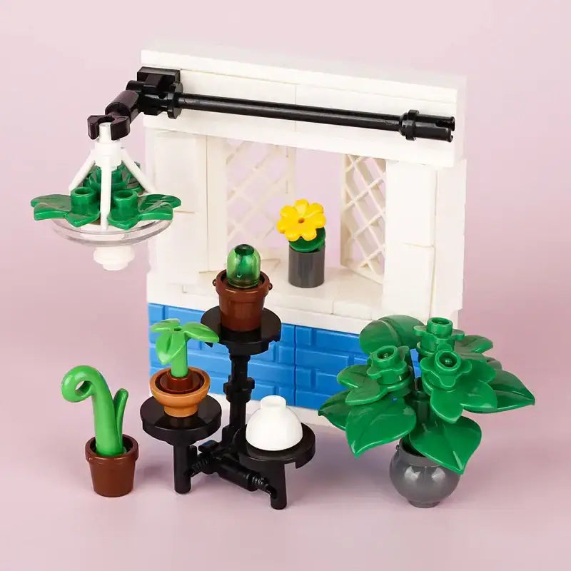 Lego moc décoration intérieure maison moderne avec jardin intérieur miniature, pots marron et gris, fleur jaune, lampe suspendue blanche en accessoire lego meuble