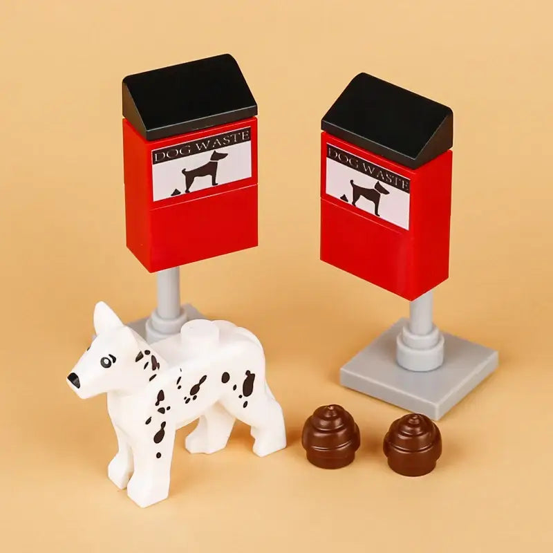 Lego moc accessoire lego rouge et noir poubelle chien avec étiquette silhouette et deux pièces lego marron décoration intérieure