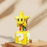 Une figurine lego moc super mario super étoile starman jaune vif perchée sur un bloc point dinterrogation avec étoiles arc-en-ciel