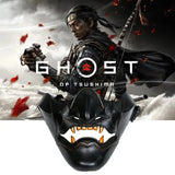 Masque ghost en résine noir laqué avec dents blanches et orange, expression menaçante pour cosplay ghost of tsushima