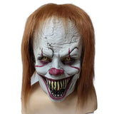Masque halloween clown ça pennywise avec cheveux rouge brun et visage blanc à texture de peau craquelée ultra-réaliste stephen king