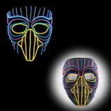 Masque halloween led en forme d oiseau avec fils led bleus, jaunes et violets lumineux pour un effet stylisé