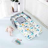 matelas-a-langer-portable-dinosaure-bleu