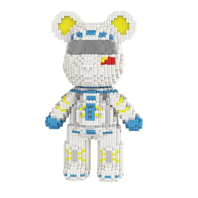Ours bearbrick astronaut blanc en mini-blocs avec accents jaunes et détails bleus sur la combinaison en plastique