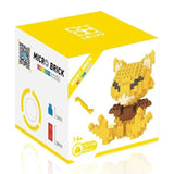 Figurine de chat jaune micro brique avec accents bruns et yeux noirs assemblée en mini brique figurines pokémon