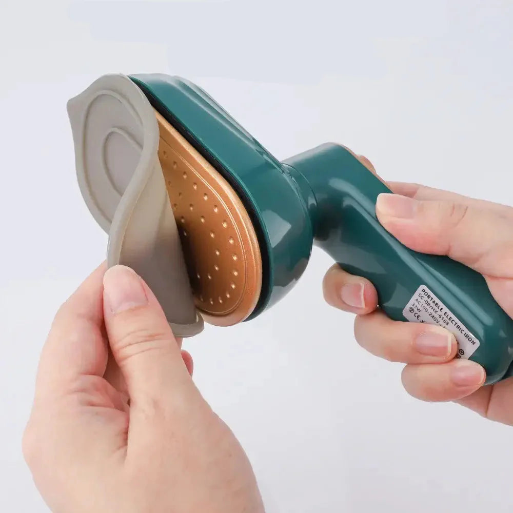 Mini handheld steam iron