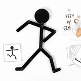 Bonhomme articulé en métal noir jeu montessori avec tête circulaire et membres articulés pour motricité fine découvrez