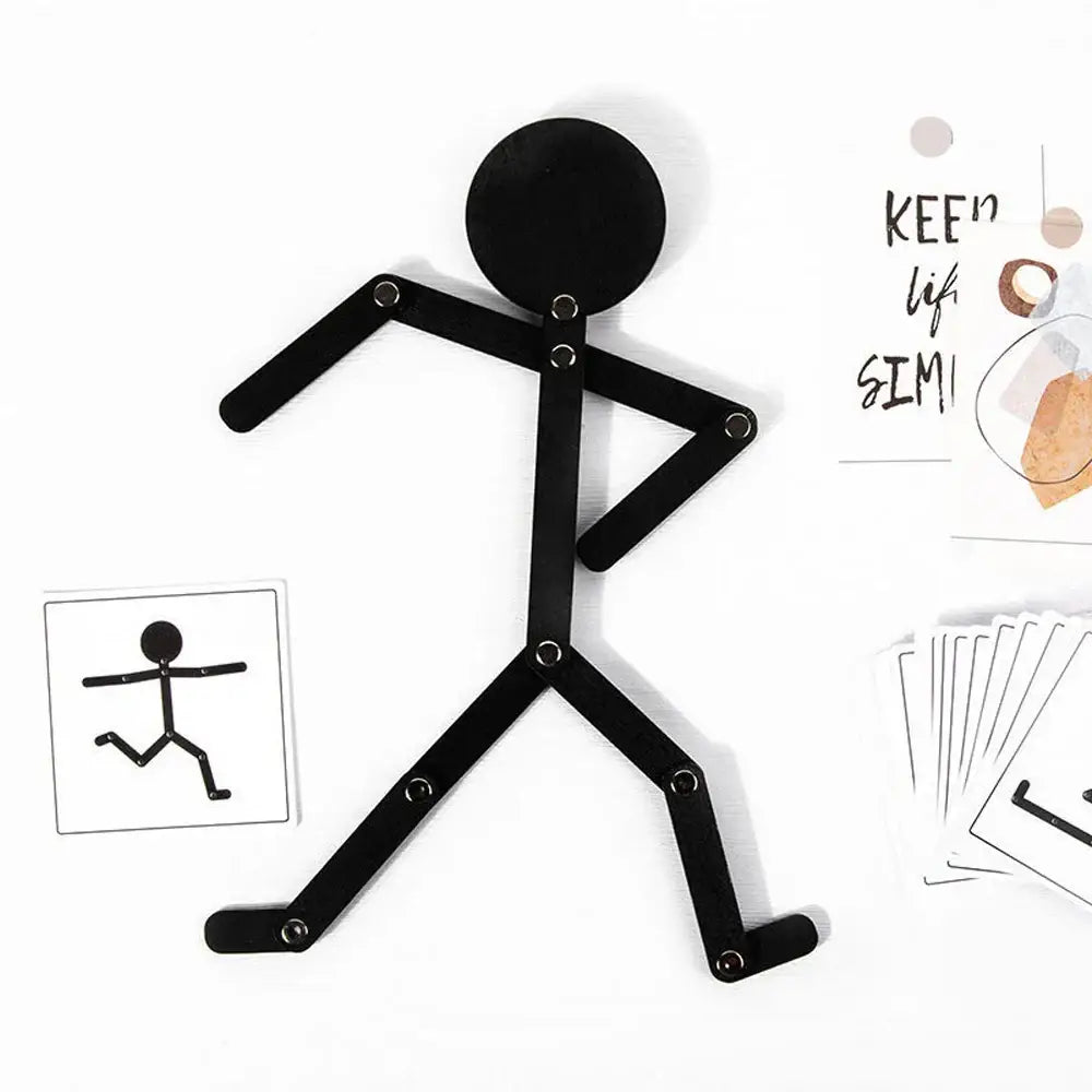 Bonhomme articulé en métal noir jeu montessori avec tête circulaire et membres articulés pour motricité fine découvrez
