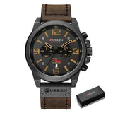 Montre à quartz homme avec chronographe noir, bracelet cuir marron et accents dorés design élégant accessoire intemporel