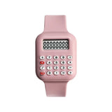 Montre numérique calculatrice pour enfants avec bracelet silicone rose et boutons blancs idéale magasins de jouets