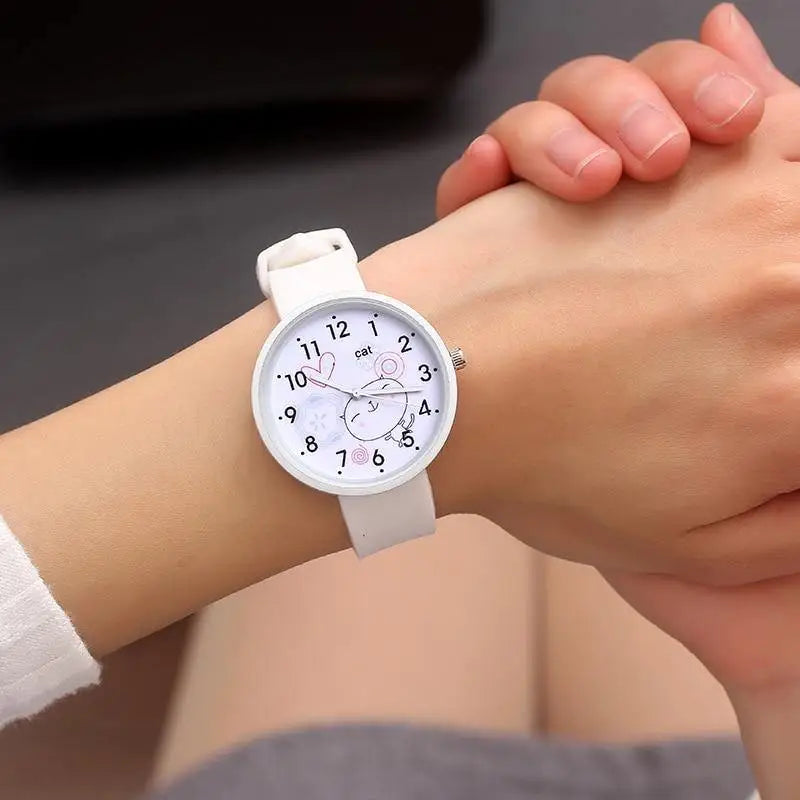 Montre quartz mignon unisexe avec design minimaliste chat blanc et bracelet silicone doux, idéale montre quartz femme