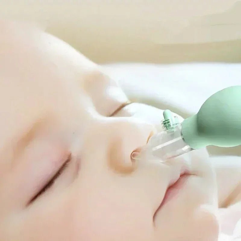 Manual nasal aspirator with silicone bulb - Green and Pink