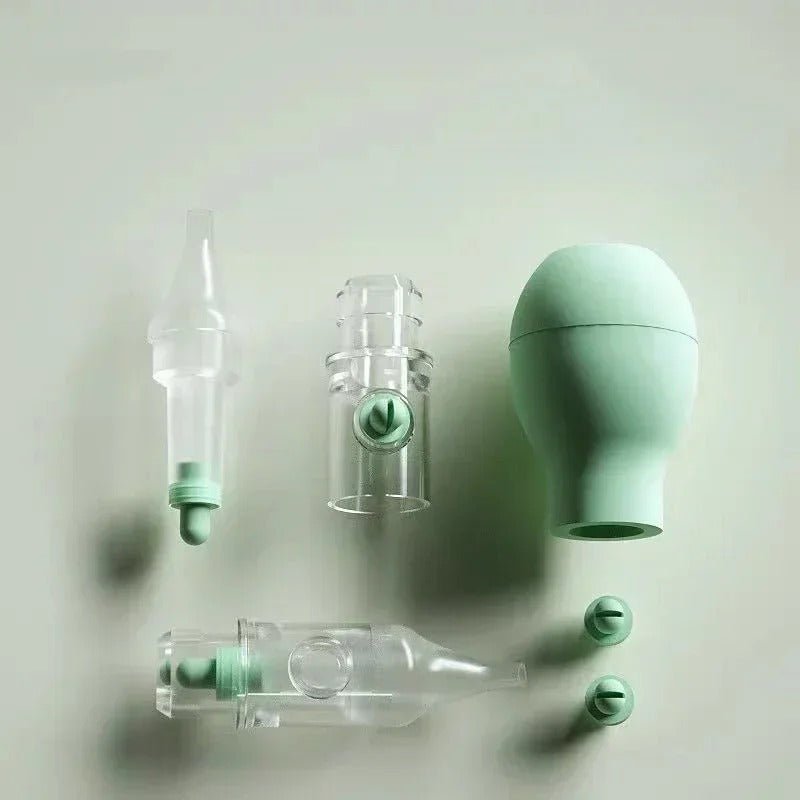 Manual nasal aspirator with silicone bulb - Green and Pink