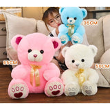 Teddy bear - white, blue, and pink
