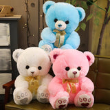 Teddy bear - white, blue, and pink