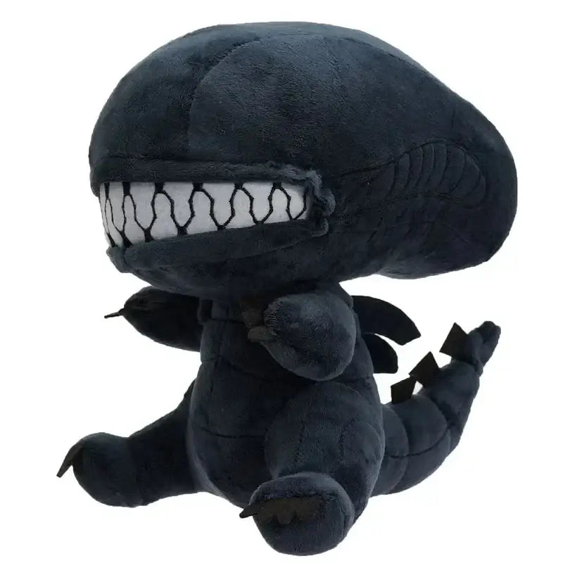 Peluche alien xenomorphe noire en tissu texturé avec un large sourire denté réplique fidèle de l’univers sombre et mystérieux d’alien