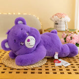 Peluche bisounours dodo calin en peluche violette avec visage blanc nez rose et sourire cousu pour doudou bisounours dodo