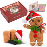 Peluche crochet bonhomme pain d’épice avec bonnet rouge, nœud vert et canne à sucre pour déco noel